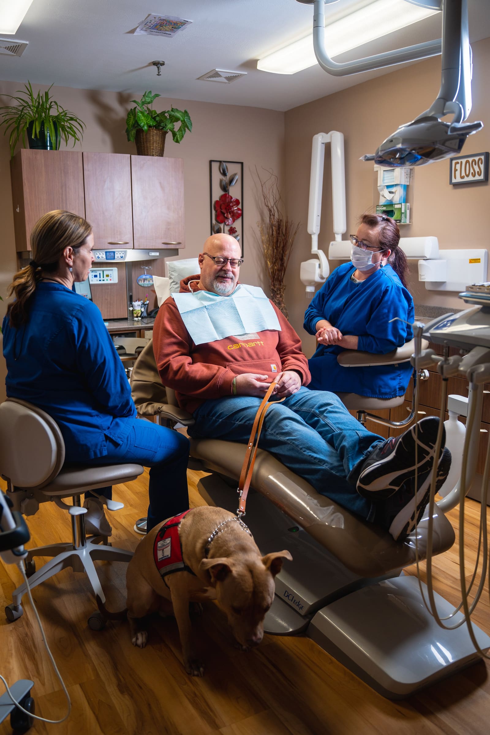 A dentist and assistant working together during a patient appointment